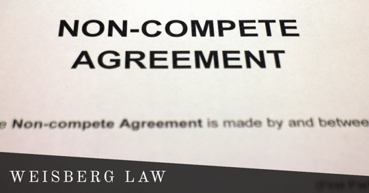 paper that reads "non-compete agreement"